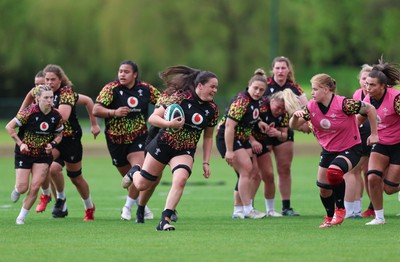 050526 - Wales Women Rugby Training Session - Jorja Aiono breaks away during training ahead of the 6 Nations match against Ireland