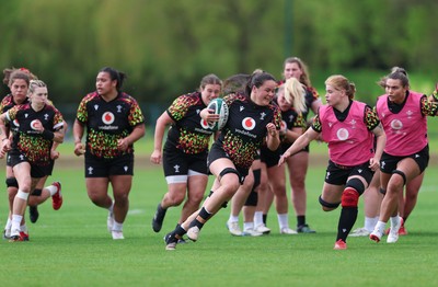 050526 - Wales Women Rugby Training Session - Jorja Aiono breaks away during training ahead of the 6 Nations match against Ireland