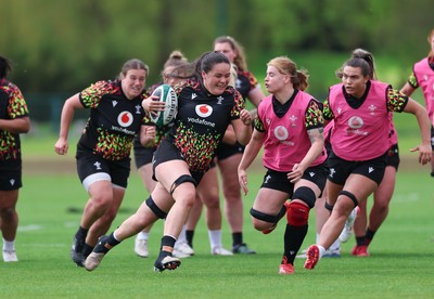 050526 - Wales Women Rugby Training Session - Jorja Aiono breaks away during training ahead of the 6 Nations match against Ireland
