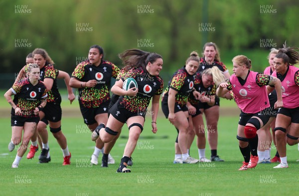 050526 - Wales Women Rugby Training Session - Jorja Aiono breaks away during training ahead of the 6 Nations match against Ireland