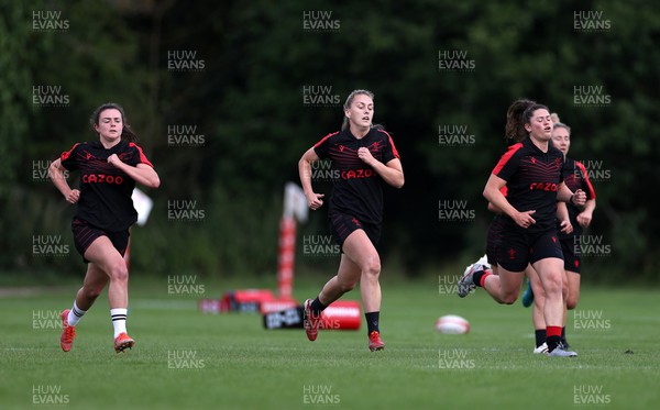 050722 - Wales Women Rugby Squad back in training as the road to the World Cup begins - Eloise Hayward, Hannah Jones and Robyn Wilkins during training