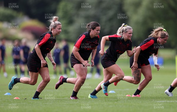 050722 - Wales Women Rugby Squad back in training as the road to the World Cup begins - Elinor Snowsill, Sioned Harris, Alex Callender during training