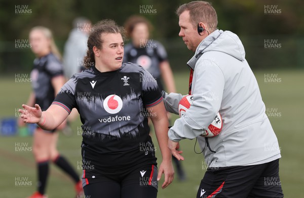 060423 -  Wales Women Rugby Squad - Carys Phillips with Wales head coach Ioan Cunningham during a training session ahead of their TicTok Women’s 6 Nations match against England
