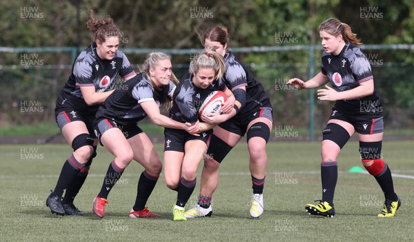060423 -  Wales Women Rugby Squad - Elinor Snowsill centre with left to right, Natalia John, Hannah Jones, Kate Williams and Bethan Lewis during a training session ahead of their TicTok Women’s 6 Nations match against England