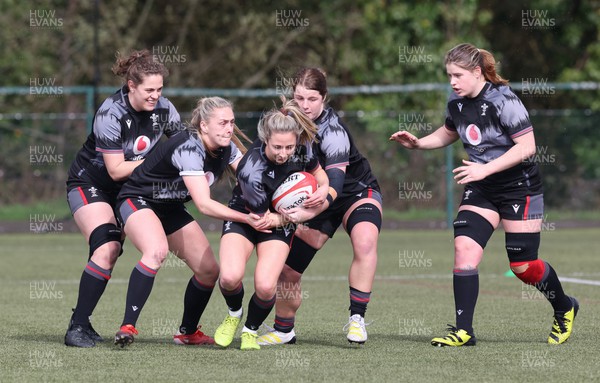 060423 -  Wales Women Rugby Squad - Elinor Snowsill centre with left to right, Natalia John, Hannah Jones, Kate Williams and Bethan Lewis during a training session ahead of their TicTok Women’s 6 Nations match against England