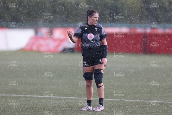 060423 -  Wales Women Rugby Squad - Georgia Evans assess the rain during a training session ahead of their TicTok Women’s 6 Nations match against England
