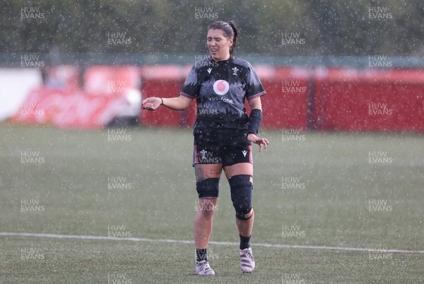 060423 -  Wales Women Rugby Squad - Georgia Evans assess the rain during a training session ahead of their TicTok Women’s 6 Nations match against England