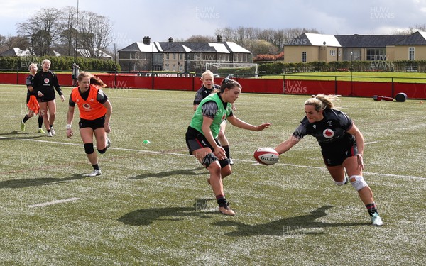 060423 -  Wales Women Rugby Squad - Courtney Keight takes on Bryonie King during a training session ahead of their TicTok Women’s 6 Nations match against England