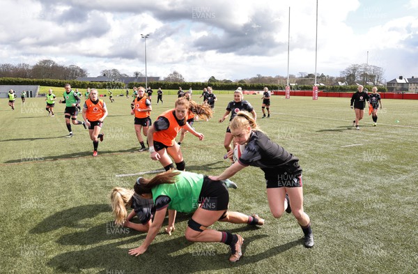060423 -  Wales Women Rugby Squad - Catherine Richards breaks during a training session ahead of their TicTok Women’s 6 Nations match against England
