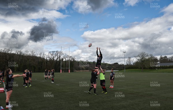 060423 -  Wales Women Rugby Squad - Charlie Mundaytakes the ball during a training session ahead of their TicTok Women’s 6 Nations match against England