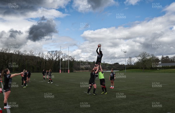 060423 -  Wales Women Rugby Squad - Charlie Mundaytakes the ball during a training session ahead of their TicTok Women’s 6 Nations match against England