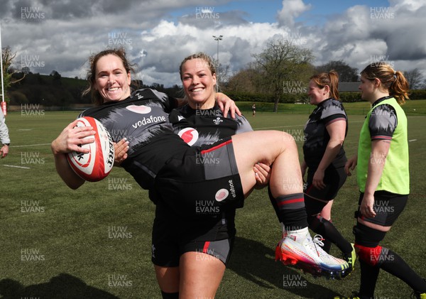060423 -  Wales Women Rugby Squad - Kat Evans and Kelsey Jones all smiles at the end of a training session ahead of their TicTok Women’s 6 Nations match against England