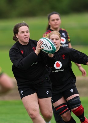 060526 - Wales Women Rugby Training Session - Maisie Davies with Bethan Lewis and Jorja Aiono during training ahead of the 6 Nations match against Ireland