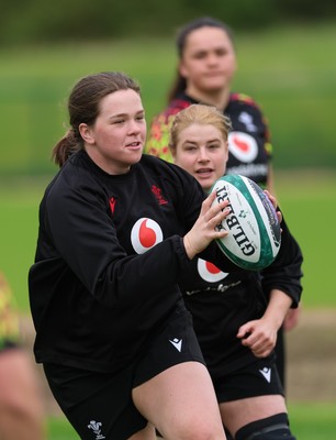 060526 - Wales Women Rugby Training Session - Maisie Davies with Bethan Lewis and Jorja Aiono during training ahead of the 6 Nations match against Ireland