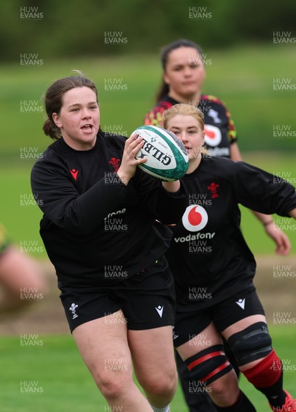 060526 - Wales Women Rugby Training Session - Maisie Davies with Bethan Lewis and Jorja Aiono during training ahead of the 6 Nations match against Ireland