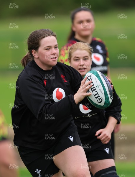 060526 - Wales Women Rugby Training Session - Maisie Davies with Bethan Lewis and Jorja Aiono during training ahead of the 6 Nations match against Ireland
