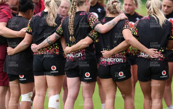 060526 - Wales Women Rugby Training Session - The Wales team huddle up during training ahead of the 6 Nations match against Ireland