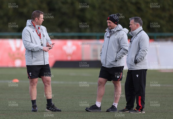 070323 - Wales Women Rugby Training Session - Head coach Ioan Cunningham, left, defence coach Mike Hill and Attack coach Shaun Connor during training session