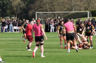 070426 - Wales Women Rugby Squad - Competition winners watch the Wales Women training session ahead of the opening Women’s 6 Nations match against Scotland