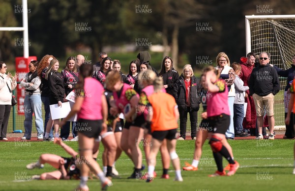 070426 - Wales Women Rugby Squad - Competition winners watch the Wales Women training session ahead of the opening Women’s 6 Nations match against Scotland