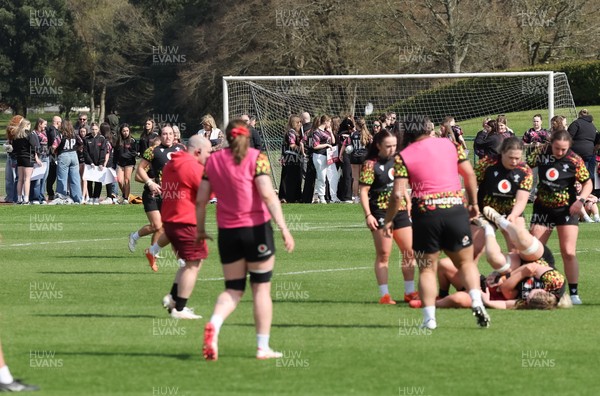 070426 - Wales Women Rugby Squad - Competition winners watch the Wales Women training session ahead of the opening Women’s 6 Nations match against Scotland