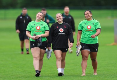 071026 Wales Women Rugby Training - Gwenllian Pyrs, Kelsey Jones and Sisilia Tuipulotu during a rugby training session ahead of the WXV matches in Japan