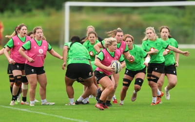071026 Wales Women Rugby Training - Molly Reardon breaks away during a rugby training session ahead of the WXV matches in Japan