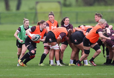 080424 - Wales Women Rugby Training Session - Bethan Lewis breaks during a training session ahead of Wales’ Women’s 6 Nations match against Ireland