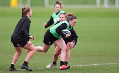 080424 - Wales Women Rugby Training Session - Jenny Hesketh breaks away during a training session ahead of Wales’ Women’s 6 Nations match against Ireland