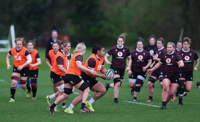 080424 - Wales Women Rugby Training Session - Sisilia Tuipulotu breaks during a training session ahead of Wales’ Women’s 6 Nations match against Ireland