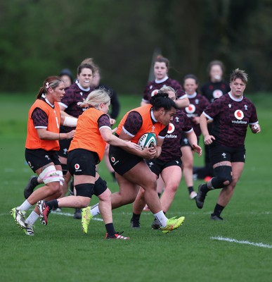 080424 - Wales Women Rugby Training Session - Sisilia Tuipulotu breaks during a training session ahead of Wales’ Women’s 6 Nations match against Ireland