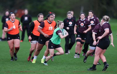 080424 - Wales Women Rugby Training Session - Keira Bevan breaks during a training session ahead of Wales’ Women’s 6 Nations match against Ireland