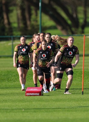 080426 - Wales Women Rugby Squad - Wales Women warm up during training session ahead of the opening Women’s 6 Nations match against Scotland