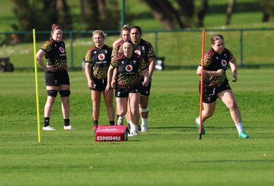 080426 - Wales Women Rugby Squad - Wales Women warm up during training session ahead of the opening Women’s 6 Nations match against Scotland