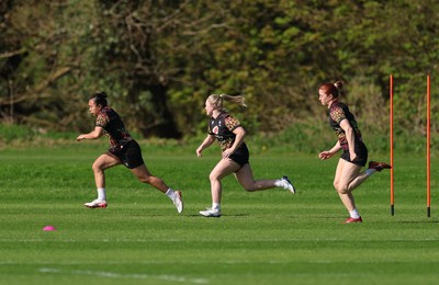 080426 - Wales Women Rugby Squad - Jenna De Vera, Seren Lockwood and Lisa Neumann during training session ahead of the opening Women’s 6 Nations match against Scotland