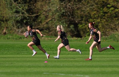 080426 - Wales Women Rugby Squad - Jenna De Vera, Seren Lockwood and Lisa Neumann during training session ahead of the opening Women’s 6 Nations match against Scotland