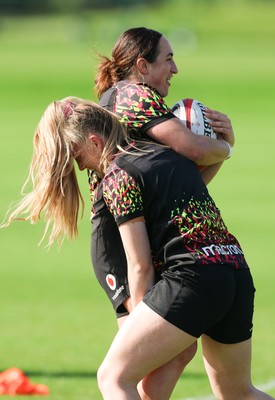 080426 - Wales Women Rugby Squad - Courtney Keight and Hannah Dallavalle during training session ahead of the opening Women’s 6 Nations match against Scotland