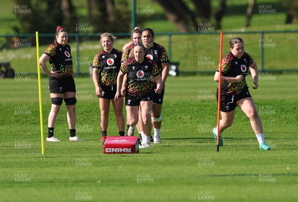 080426 - Wales Women Rugby Squad - Wales Women warm up during training session ahead of the opening Women’s 6 Nations match against Scotland