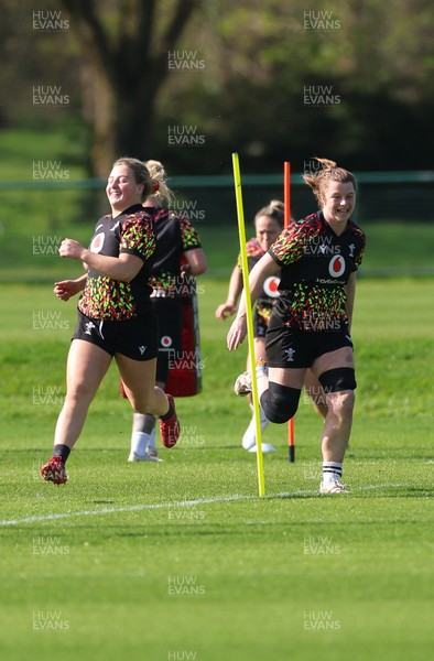 080426 - Wales Women Rugby Squad - Molly Reardon and Kate Williams warm up during training session ahead of the opening Women’s 6 Nations match against Scotland