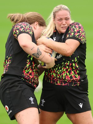 080926 - Wales Women Rugby Training - Kelsey Jones and Maisie Davies during a rugby session ahead of the WXV Series of matches