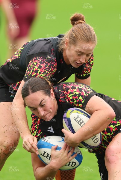 080926 - Wales Women Rugby Training - Lisa Neumann and Courtney Keight during a rugby session ahead of the WXV Series of matches