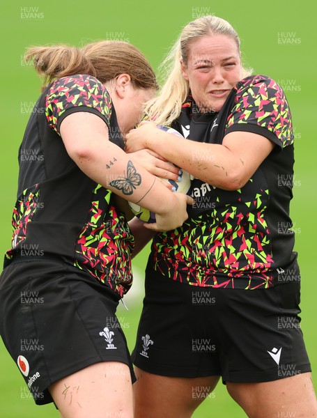 080926 - Wales Women Rugby Training - Kelsey Jones and Maisie Davies during a rugby session ahead of the WXV Series of matches