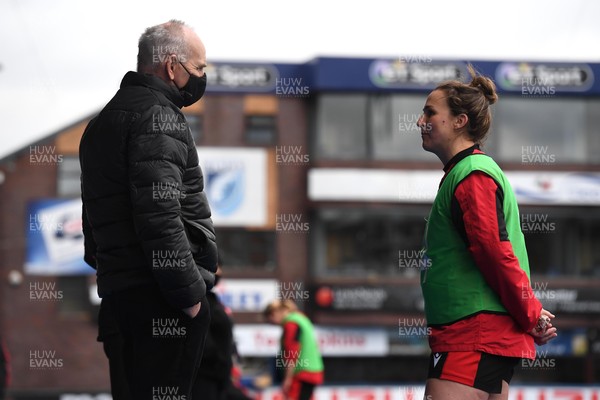 090421 - Wales Women Rugby Training - WRU Chairman Rob Butcher talks to Siwan Lillicrap during training
