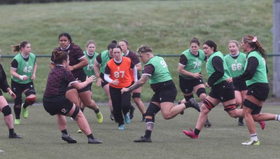 100424 - Wales Women Rugby Training - Donna Rose charges forward during a training session ahead of Wales’ Women’s 6 Nations match against Ireland