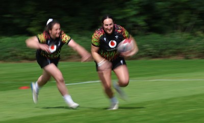 130526 - Wales Women Rugby Training - Courtney Keight and Kayleigh Powell during a rugby training session ahead of their final Women’s 6 Nations match against Italy