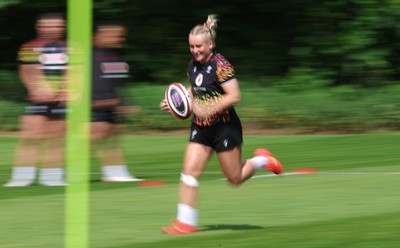 130526 - Wales Women Rugby Training - Seren Singleton during a rugby training session ahead of their final Women’s 6 Nations match against Italy