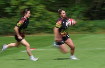 130526 - Wales Women Rugby Training - Amy Williams with Jasmine Joyce during a rugby training session ahead of their final Women’s 6 Nations match against Italy