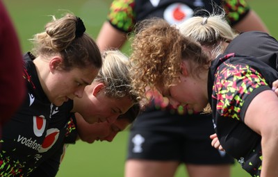 130526 - Wales Women Rugby Training - Jenni Scoble and Gwenllian Pyrs during a rugby training session ahead of their final Women’s 6 Nations match against Italy