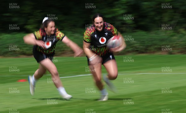 130526 - Wales Women Rugby Training - Courtney Keight and Kayleigh Powell during a rugby training session ahead of their final Women’s 6 Nations match against Italy