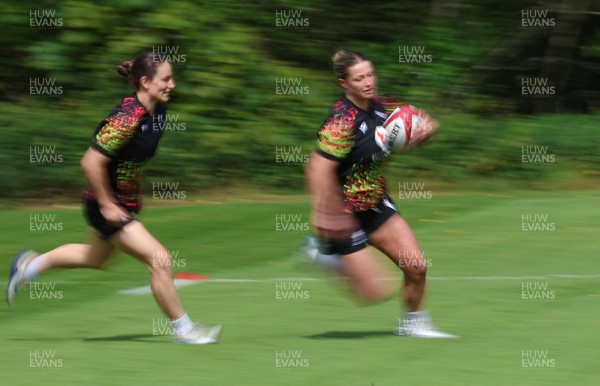 130526 - Wales Women Rugby Training - Amy Williams with Jasmine Joyce during a rugby training session ahead of their final Women’s 6 Nations match against Italy